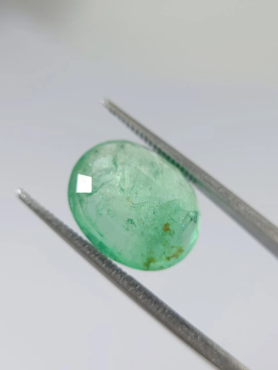 7.7ct Oval Faceted Minor Oiled Panjshir Emerald from Afghanistan — view 4